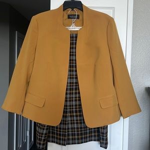 Black Label Suit jacket and skirt. Jacket size 16. Skirt size 18. EUC.